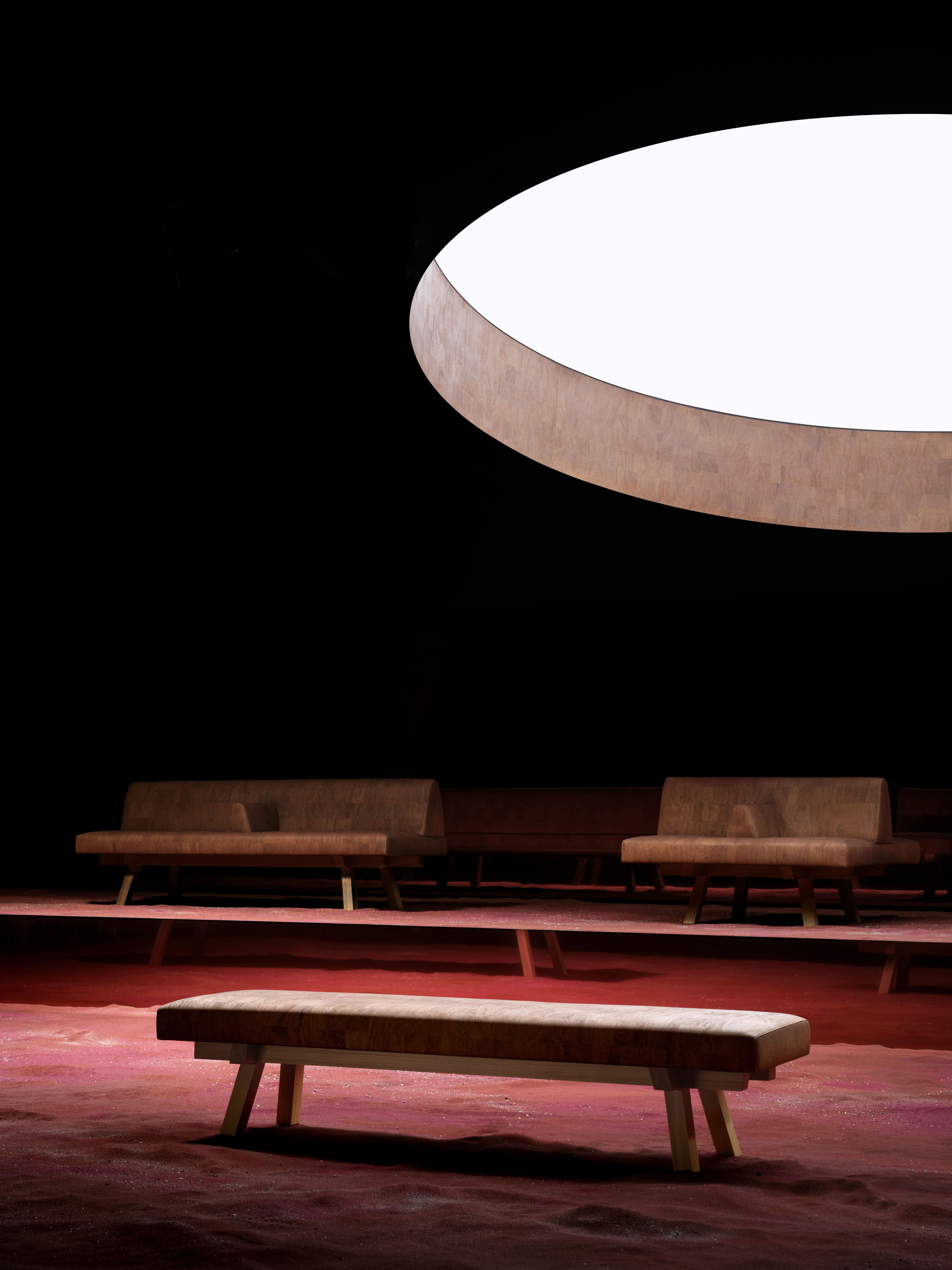 Cork-clad elements. In the foreground, the bench; in the background, the single- and double-sided sofas | Ph. Alberto Strada