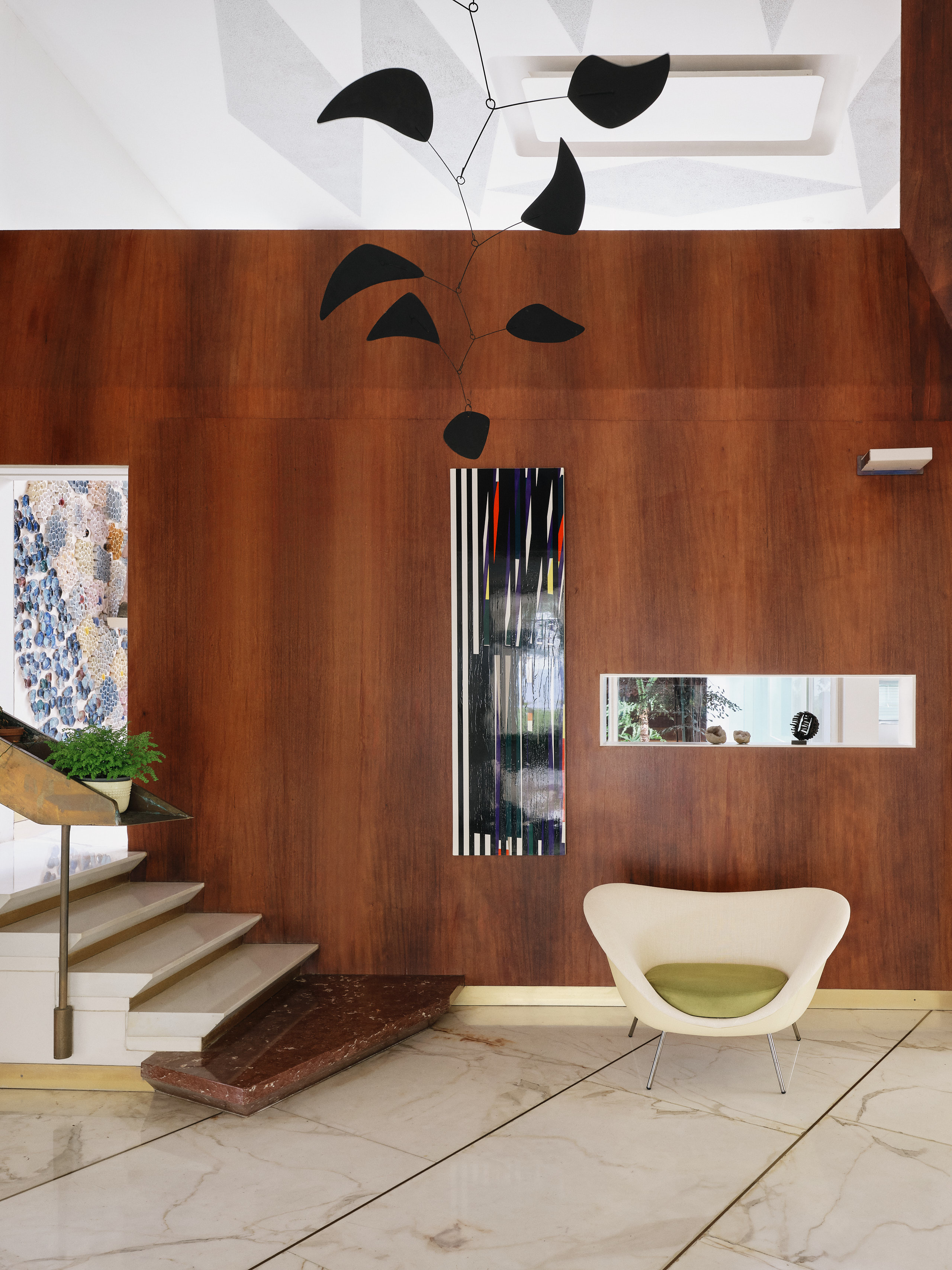 The entrance houses a hanging mobile created by Alexander Calder