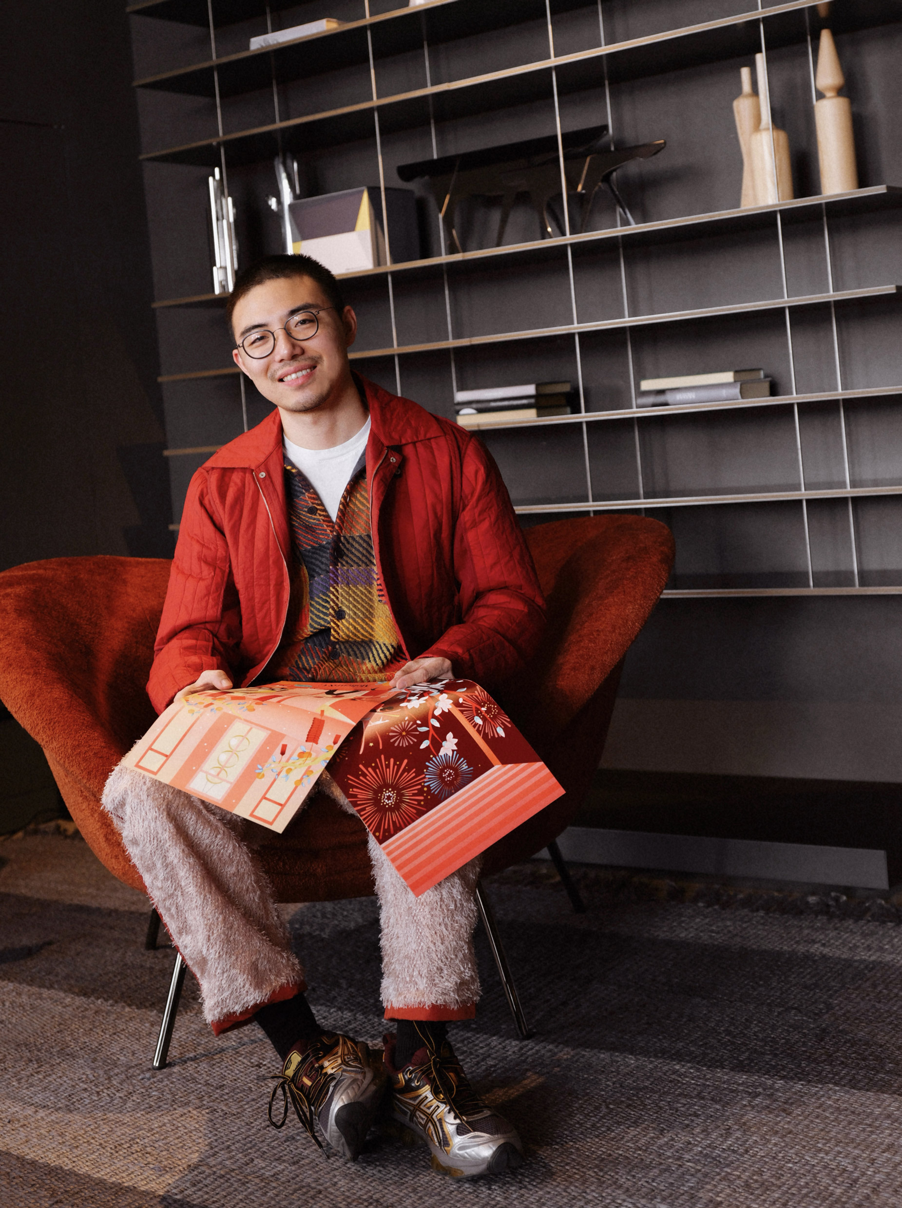 Yulong Lli with his illustrations celebrating 2026 Lunar Year at Molteni&C Shanghai Flagship Store